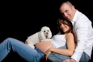 <img src="pregnant couple with dog" alt="happy pregnant couple with dog">